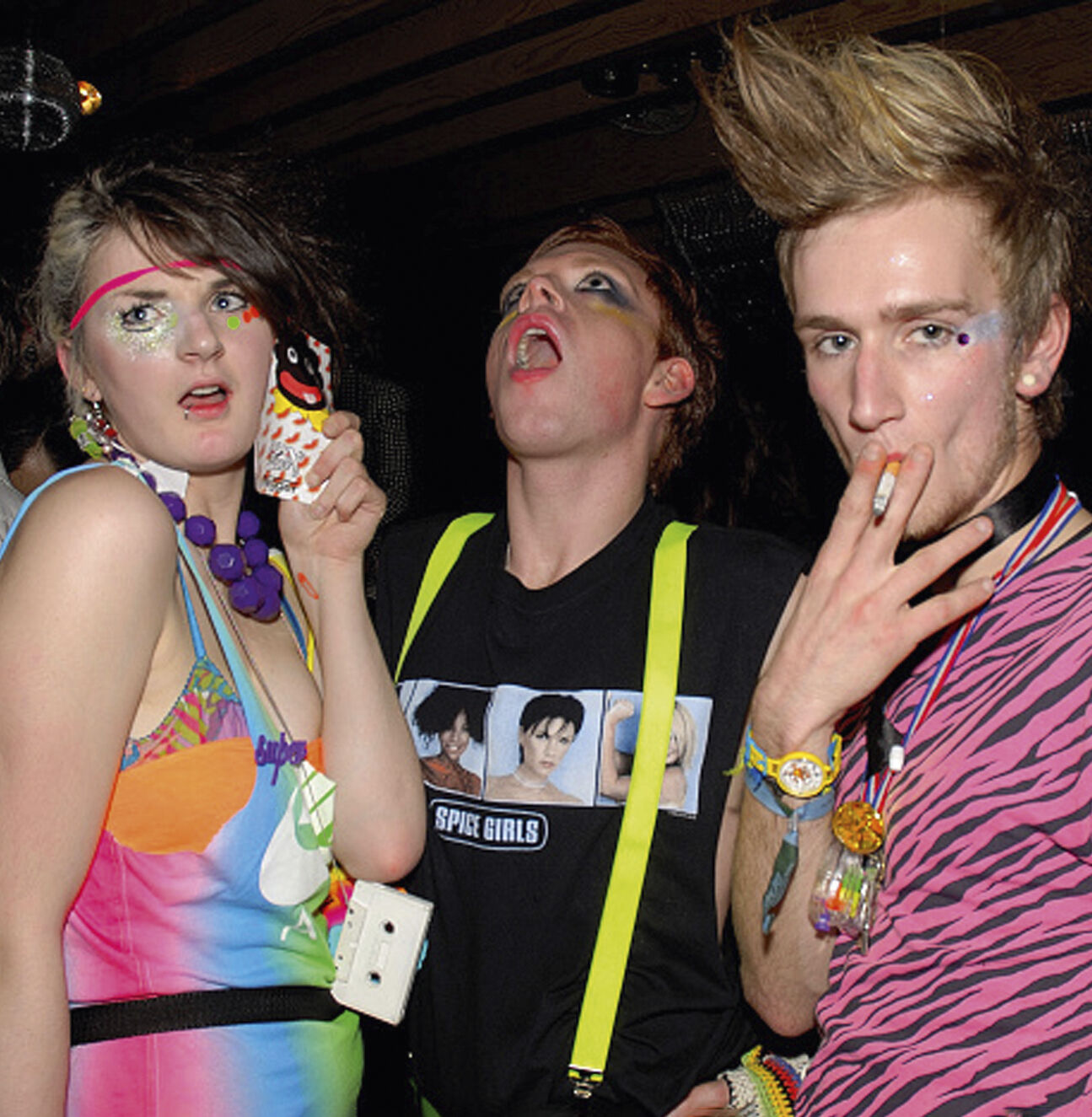 A girl and two guys wearing New Rave styles, Anti-Social, London December 2006